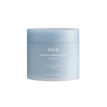 Load image into Gallery viewer, ABIB Sedum Hyaluron Pad Hydrating Touch offers deep hydration and soothing care with Sedum Sarmentosum Extract and multiple forms of Hyaluronic Acid. These pads are designed to deliver moisture and comfort to your skin, leaving it feeling refreshed and revitalized. Ideal for a quick hydration boost.