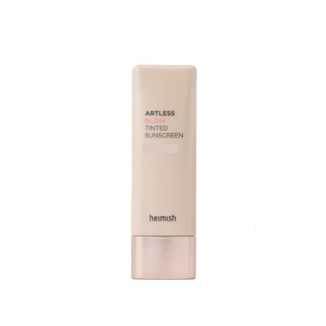 HEIMISH Artless Glow Tinted Sunscreen Shine Beige delivers a natural, radiant finish while providing a hint of coverage to even out skin tone. Infused with pearl extract and botanical ingredients like rosa canina fruit and thyme leaf extracts, it nourishes and revitalizes the skin. The lightweight formula blends effortlessly, leaving a dewy, glowing finish without feeling heavy or sticky. Enhanced with niacinamide and adenosine, it helps brighten and support skin elasticity, making it a perfect choice for a