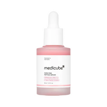 Load image into Gallery viewer, MEDICUBE PDRN Pink Peptide Serum is a rejuvenating serum designed to enhance skin elasticity and reduce the appearance of wrinkles. Formulated with a potent blend of peptides, including Copper Tripeptide-1 and Palmitoyl Pentapeptide-4, it effectively stimulates collagen production to firm and smooth the skin. Niacinamide brightens and evens out skin tone, while Sodium DNA and Hydrolyzed Collagen provide deep hydration and repair. Additional extracts like Turmeric and Neem soothe and protect the skin, making