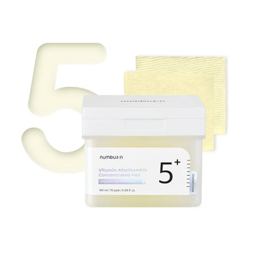 NUMBUZIN No.5 Vitamin-Niacinamide Concentrated Pad is a brightening and soothing pad infused with 50,000 ppm of Niacinamide to improve skin tone and texture. Enriched with Vitamin C, Tranexamic Acid, and Hyaluronic Acid, it helps to brighten, hydrate, and smooth the skin. Perfect for daily use, this pad promotes a radiant and refreshed complexion while gently addressing redness and uneven skin tone.