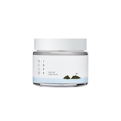 ROUND LAB 1025 Dokdo Cream is a rich, hydrating moisturizer designed to deeply nourish and protect the skin. It combines the power of Sea Water, Shea Butter, and Hyaluronic Acid to provide intense moisture and improve skin elasticity. Enriched with a complex of Ceramides (AP, AS, EOP, NP, NS), it strengthens the skin barrier, while Panthenol and Allantoin soothe and calm the skin. Ideal for all skin types, this cream helps achieve a smooth, hydrated, and healthy complexion.