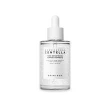 Load image into Gallery viewer, SKIN1004 Madagascar Centella Tone Brightening Capsule Ampoule is a lightweight yet powerful serum designed to brighten and even out skin tone. Formulated with Niacinamide, Tranexamic Acid, and Centella Asiatica Extract, it helps reduce dark spots, soothe irritation, and improve skin clarity. Enriched with Madecassoside and 3-O-Ethyl Ascorbic Acid (a stable form of Vitamin C), this ampoule hydrates and revitalizes tired skin while boosting its natural glow. Ideal for all skin types, it delivers a fresh and r