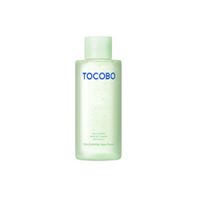 Load image into Gallery viewer, TOCOBO Cica Calming Aqua Toner is a refreshing and soothing toner designed to calm and hydrate sensitive skin. Enriched with Centella Asiatica Leaf Extract, Aloe Ferox Leaf Extract, and a blend of soothing botanicals like Chamomile and Lavender, it helps reduce redness and irritation while deeply moisturizing the skin. Niacinamide brightens and balances the skin tone, while multiple forms of Hyaluronic Acid and Ceramide NP provide lasting hydration. This gentle toner is perfect for daily use, leaving the sk