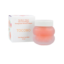 Load image into Gallery viewer, TOCOBO Vita Glazed Lip Mask is a deeply nourishing lip treatment designed to hydrate and protect the lips while providing a glossy finish. Enriched with a blend of nourishing oils such as Olive Fruit Oil, Jojoba Seed Oil, and Hippophae Rhamnoides Fruit Oil, this lip mask helps lock in moisture, leaving lips soft and supple. Infused with Vitamin E and antioxidant-rich extracts like Punica Granatum Flower Extract and Eclipta Prostrata Extract, it soothes and revitalizes dry, chapped lips. Ideal for overnight 