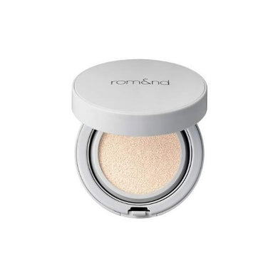 ROMAND Zero Cushion delivers a flawless, lightweight finish with buildable coverage that feels like a second skin. Infused with Niacinamide and Adenosine, it brightens and improves skin elasticity while providing a smooth, natural look. With its long-lasting formula, this cushion keeps your skin looking fresh and radiant throughout the day, making it perfect for a seamless, everyday makeup routine.