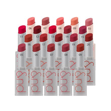 Load image into Gallery viewer, ROMAND Zero Matte Lipstick Renewed delivers intense color with a smooth, matte finish. Formulated with hydrating ingredients like Sodium Hyaluronate and Cotton Seed Extract, this lipstick glides on effortlessly, providing a comfortable, non-drying feel. The lightweight formula includes a blend of silicone and wax for long-lasting wear, while the vibrant pigments ensure rich, bold color. Perfect for those seeking a soft, matte look that lasts all day without sacrificing moisture.